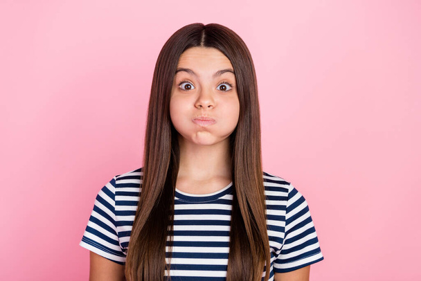 Photo of fooling funky girl dressed striped clothes big eyes bloated cheeks isolated pink color background - Φωτογραφία, εικόνα