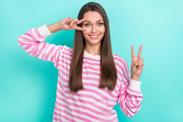 Portrait of attractive cheerful girl good mood showing v-sign party time isolated over bright teal turquoise color background - Fotografie, Obrázek