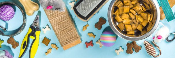 Pet food and accessories, various cat, dog, domestic animals food, toys, treats, utensils. Zoomarket and pet store, online shopping, pet care concept, flatlay banner top view copespace - Photo, Image