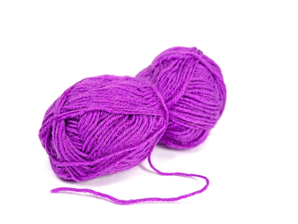 Purple knitting yarn against a white background - Photo, Image