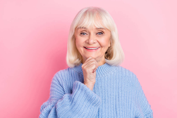 Photo of cheerful senior woman good mood hand touch chin smart think isolated over pink color background - Fotografie, Obrázek