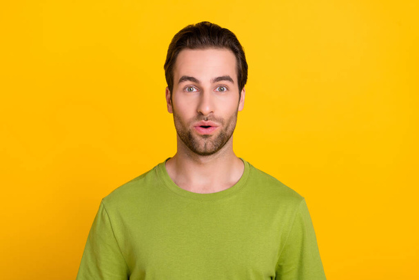 Photo of young guy impressed fake novelty gossip rumor wear casual clothes isolated over yellow color background - Photo, image