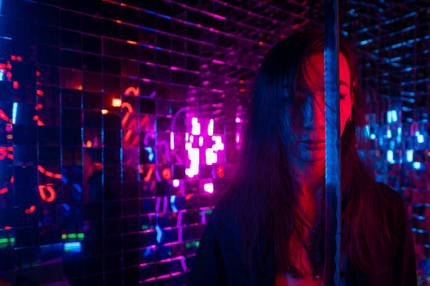 Male transgender neon light studio. Asian with samurai sword. - Foto, Imagem