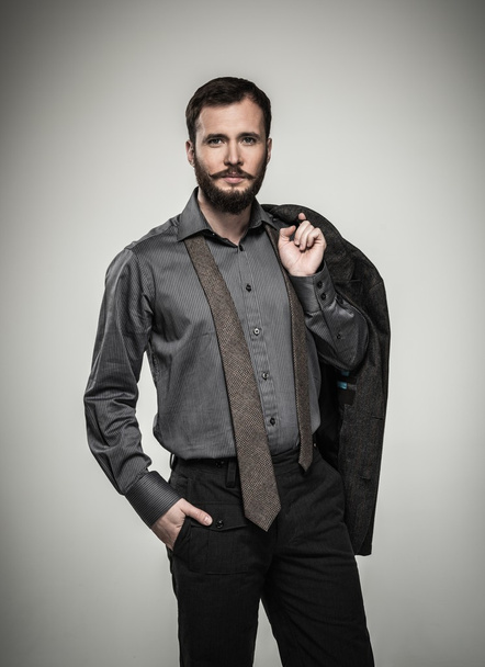 Handsome man with beard and jacket  - Фото, изображение
