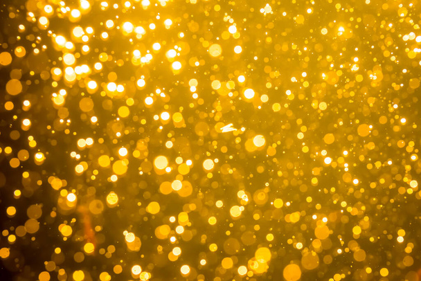 Luzes de brilho embaçado dourado bokeh abstrato para Feliz Natal e Ano Novo fundo - Foto, Imagem