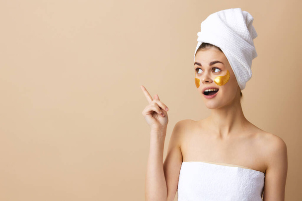woman skin care face patches bare shoulders hygiene isolated background - Φωτογραφία, εικόνα