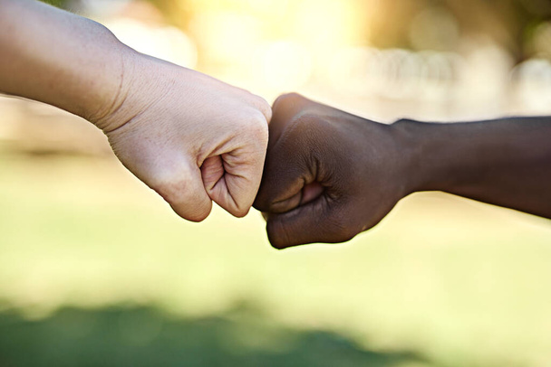 Ill always have your back. Cropped shot of two unrecognisable people fist bumping each other. - Zdjęcie, obraz