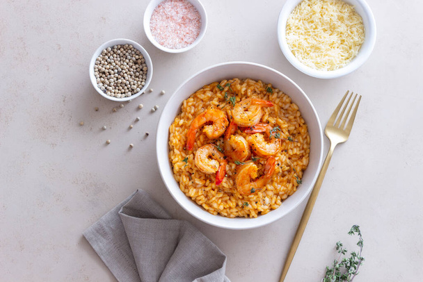 Risotto with shrimps, tomatoes and thyme. Italian food - Fotografie, Obrázek