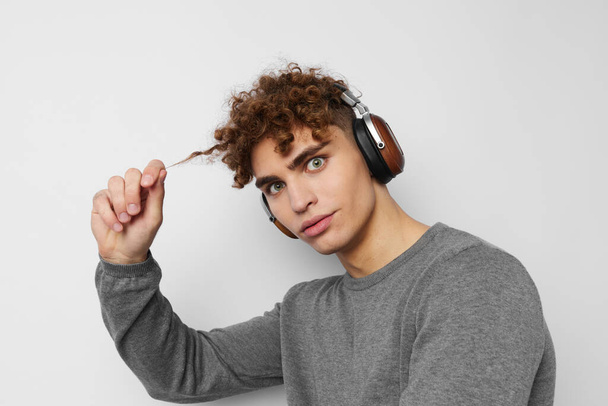 handsome young man headphone music technology isolated background - Φωτογραφία, εικόνα