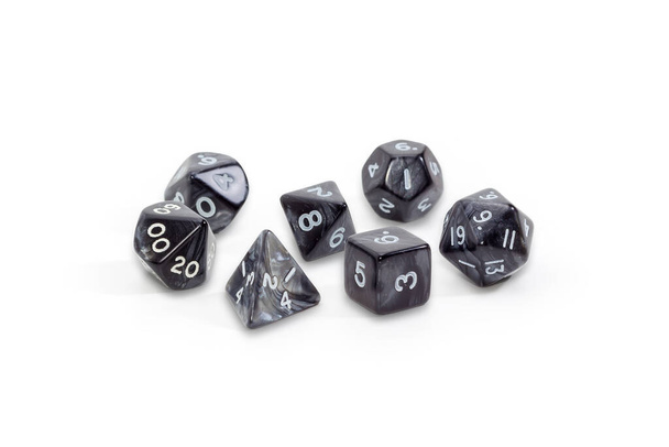 Set of specialized polyhedral dice with numbers used in role-playing games on a white background - Photo, Image