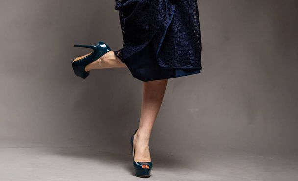 Perfect female legs wearing high heels - Photo, Image