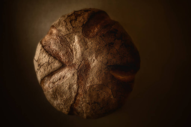 single french loaf bread isolated on organic background - 写真・画像