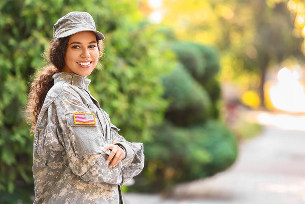 Portrait of African-American female soldier outdoors - Photo, Image