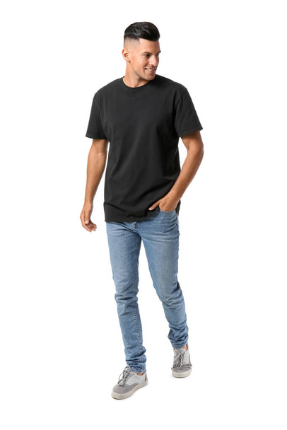 Handsome young man in stylish t-shirt isolated on white - Φωτογραφία, εικόνα