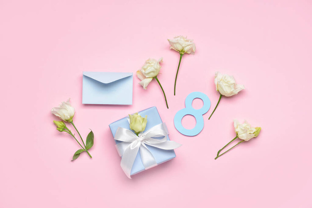 Composition with gift box, flowers and envelope for International Women's Day on color background - Fotoğraf, Görsel