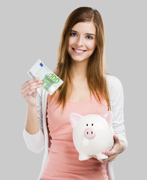 Woman saving money - Fotó, kép