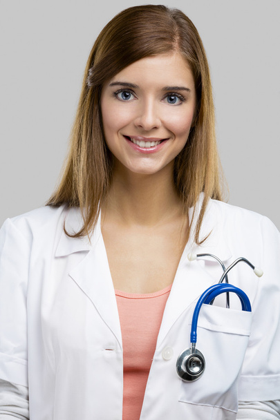 Beautiful young female doctor - Фото, изображение