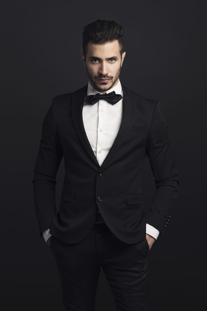 Latin man wearing a tuxedo - Fotó, kép