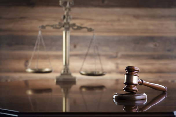 Law concept. Law symbols composition: judges gavel, Themis sculpture and scale on the brown background. - Photo, Image
