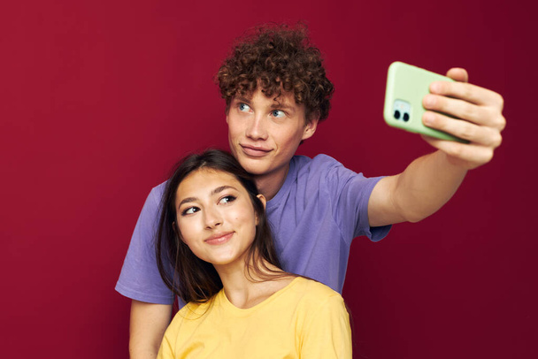 Man and woman modern style emotions fun phone Youth style - Valokuva, kuva