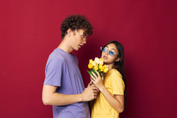 teenagers bouquet of flowers gift romance isolated background unaltered - Φωτογραφία, εικόνα