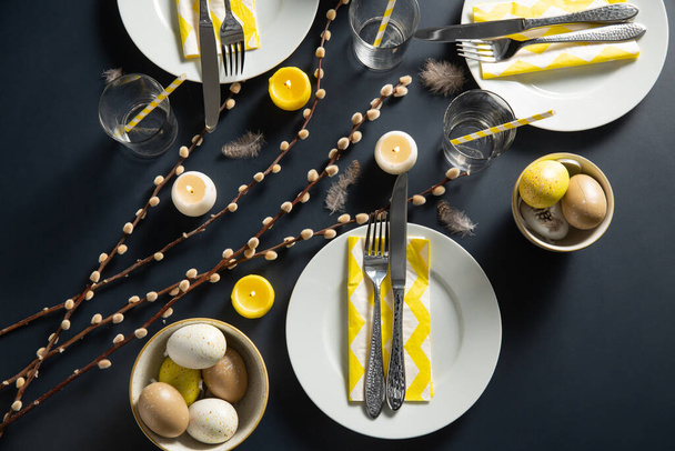 close up of easter table serving over black - Фото, зображення