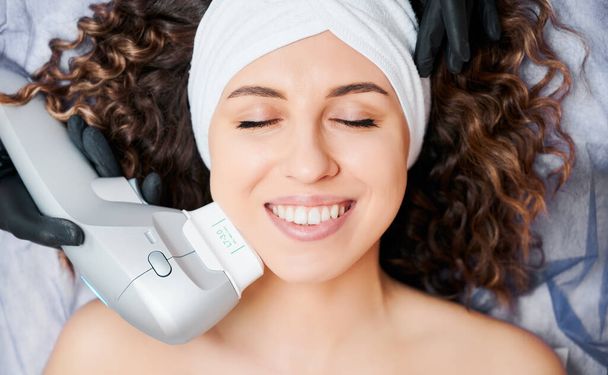 Process improvements skin with modern equipment for woman. - Photo, Image