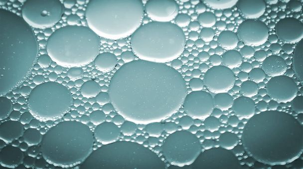 Gotas de aceite de macro en líquido - Foto, imagen