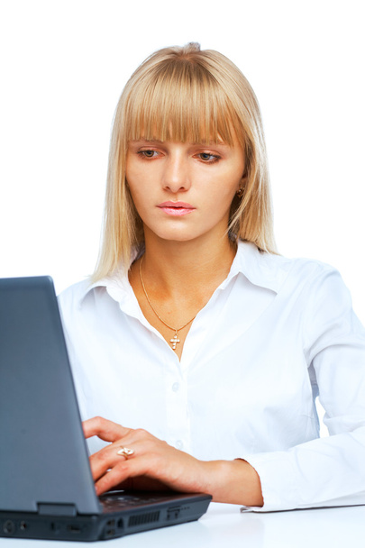 Portrait of woman working on a laptop - Foto, Imagen