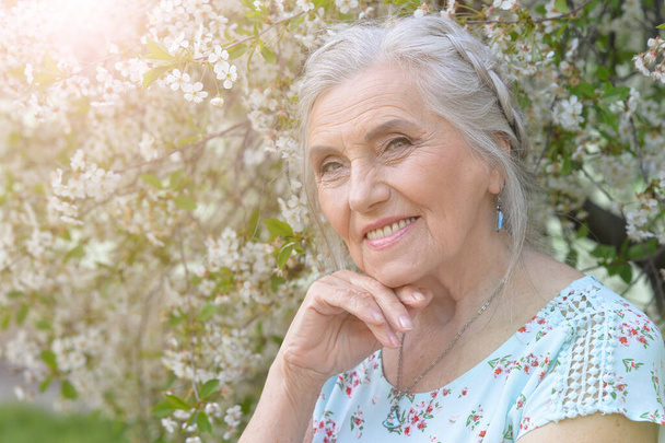 happy smiling senior woman  posing in park - Photo, image