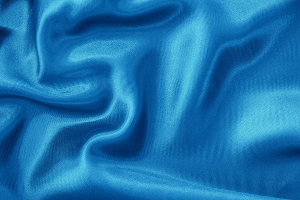 Blue fabric cloth texture for background and design art work, beautiful crumpled pattern of silk or linen. - Fotoğraf, Görsel