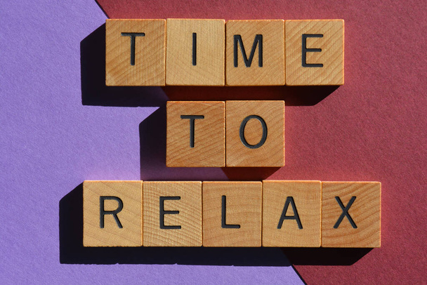 Time To Relax, words in wooden alphabet letters isolated on multicoloured background - Φωτογραφία, εικόνα
