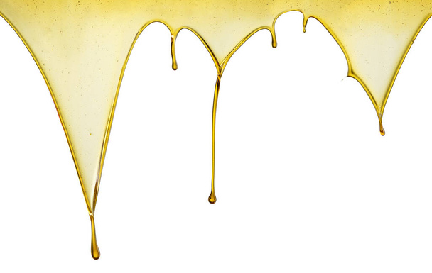 Aceite de oliva o aceite de motor que gotea sobre fondo blanco - Foto, Imagen