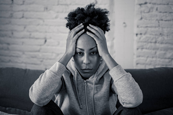 Young devastated depressed african american woman crying feeling sad, hurt suffering depression in sadness and emotional pain. Mental health in young people, bullying suicide and heartbroken concept. - Фото, зображення