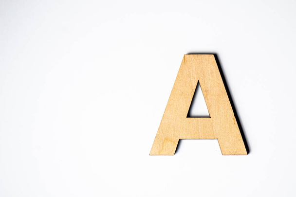 alphabet letter on white background - Фото, изображение