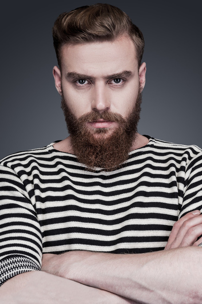 Bearded man in striped clothing - Foto, Bild