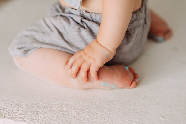 Tiny baby arms and legs. - Foto, imagen