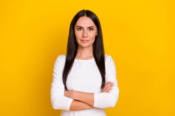 Photo of young pretty woman folded hands intelligent leader banker isolated over yellow color background. - Фото, зображення