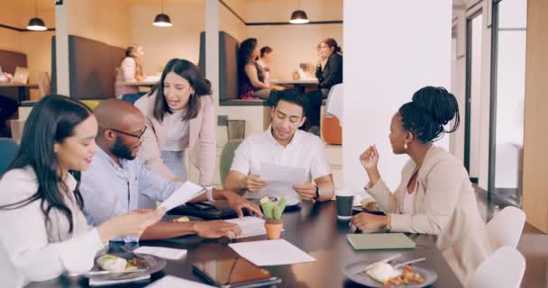 Its amazing what you can achieve if you do not care who gets the credit. 4k video footage of a group of young coworkers brainstorming over a lunch meeting in a restaurant. - Felvétel, videó