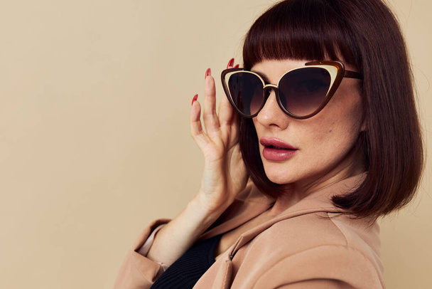 beautiful woman in a beige jacket elegant style sunglasses Lifestyle unaltered - Fotografie, Obrázek