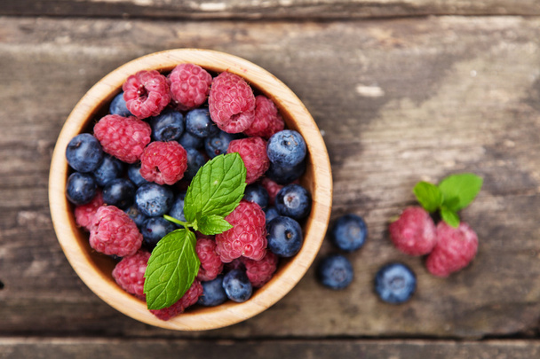 Fresh berries on a wooden table - Photo, Image