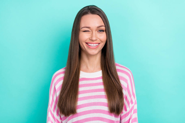 Portrait of attractive cheerful flirty brunette girl winking good mood isolated over vibrant teal turquoise color background - Valokuva, kuva