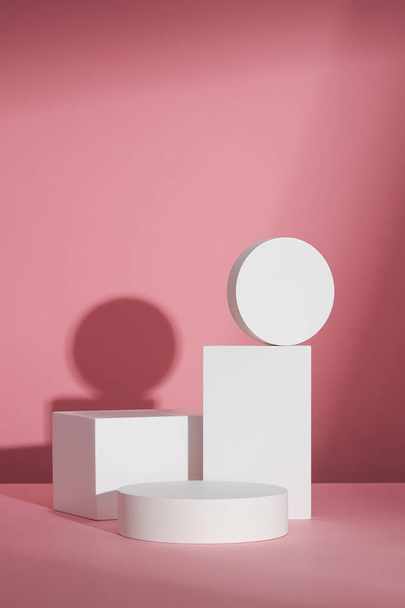 Circle , square white podium , in pink background and blank space for advertising , abstract content , front view - Foto, imagen