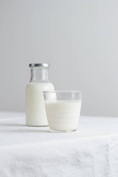Fresh Milk on the table with white tablecloth - Foto, imagen