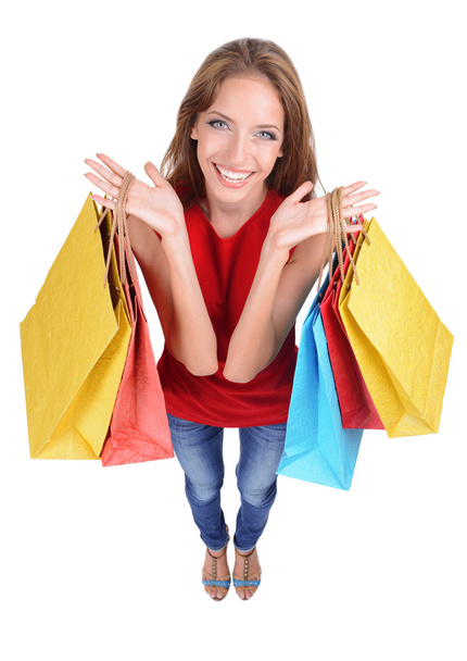 Young woman with shopping bags - Foto, afbeelding