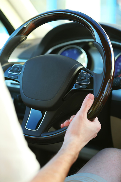 Man's hands on a steering wheel - Foto, Imagem
