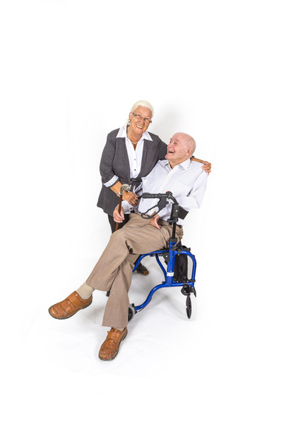 happy senior couple with man in wheelchair - Фото, изображение