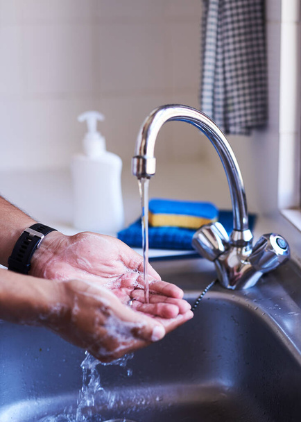 Close up shot of a businessman washing his hands in the bathroom sink - Foto, Imagem