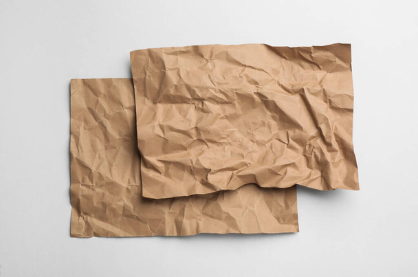 Sheets of brown paper on white background, top view - Foto, Imagen