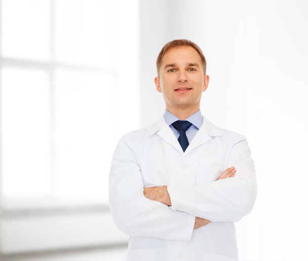 smiling male doctor in white coat - Fotoğraf, Görsel